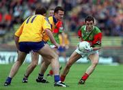 13 June 1999; Noel Connelly of Mayo in action against Fergal O'Donnell, left, and Tom Ryan of Roscommon during the Bank of Ireland Connacht Senior Football Championship semi-final match between Mayo and Roscommon at McHale Park in Castlebar, Mayo. Photo by Brendan Moran/Sportsfile