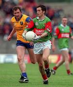 13 June 1999; Noel Connelly of Mayo in action against Fergal O'Donnell of Roscommon during the Bank of Ireland Connacht Senior Football Championship semi-final match between Mayo and Roscommon at McHale Park in Castlebar, Mayo. Photo by Brendan Moran/Sportsfile