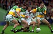 13 June 1999; Brian Lacey of Kildare in action against John Kenny, left, Cathal Daly, centre, and Finbar Cullen of Offaly during the Bank of Ireland Leinster Senior Football Championship quarter-final match between Kildare and Offaly at Croke Park in Dublin. Photo by Damien Eagers/Sportsfile