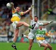 13 June 1999; James Stewart of Offaly in action against Derek Maher of Kildare during the Bank of Ireland Leinster Senior Football Championship quarter-final match between Kildare and Offaly at Croke Park in Dublin. Photo by Damien Eagers/Sportsfile