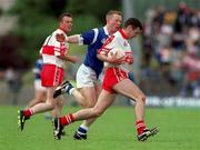 20 June 1999; Paul McFlynn of Derry in action against Jason Reilly of Cavan during the Bank of Ireland Ulster Senior Football Championship quarter-final match between Cavan and Derry at Breffni Park in Cavan. Photo by Damien Eagers/Sportsfile