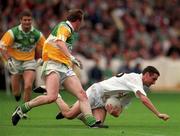 13 June 1999; Pauric Brennan of Kildare in action against David Foley of Offaly during the Bank of Ireland Leinster Senior Football Championship quarter-final match between Kildare and Offaly at Croke Park in Dublin. Photo by Damien Eagers/Sportsfile
