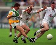 13 June 1999; Phil O'Reilly of Offaly in action against Eddie McCormack of Kildare during the Bank of Ireland Leinster Senior Football Championship quarter-final match between Kildare and Offaly at Croke Park in Dublin. Photo by Damien Eagers/Sportsfile