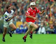 13 June 1999; Timmy McCarthy of Cork in action against Tony Browne of Waterford during the Guinness Munster Senior Hurling Championship semi-final match between Cork and Waterford at Semple Stadium in Thurles, Tipperary. Photo by Ray McManus/Sportsfile