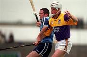 30 May 1999; Tom Dempsey of Wexford in action against John Finnegan of Dublin during the Guinness Leinster Senior Hurling Championship quarter-final match between Dublin and Wexford at Nowlan Park in Kilkenny. Photo by Ray Lohan/Sportsfile