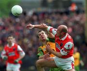 6 June 1999; Tony Boyle of Donegal in action against Gerard Reid of Armagh during the Bank of Ireland Ulster Senior Football Championship quarter-final match between Donegal and Armagh at MacCumhail Park in Ballybofey, Donegal. Photo by Ray Lohan/Sportsfile