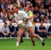 13 June 1999; Willie McCreery of Kildare in action against John Kenny of Offaly during the Bank of Ireland Leinster Senior Football Championship quarter-final match between Kildare and Offaly at Croke Park in Dublin. Photo by Damien Eagers/Sportsfile