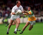 13 June 1999; Willie McCreery of Kildare in action against Roy Malone of Offaly during the Bank of Ireland Leinster Senior Football Championship quarter-final match between Kildare and Offaly at Croke Park in Dublin. Photo by Damien Eagers/Sportsfile