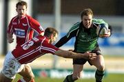 18 February 2006; Paul Warwick, Connacht, is tackled by Dafydd James, Llanelli Scarlets. Celtic League 2005-2006, Connacht v Llanelli Scarlets, Sportsground, Galway. Picture credit: Damien Eagers / SPORTSFILE