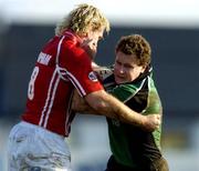 18 February 2006; Matt Mostyn, Connacht, is tackled by Alix Popham, Llanelli Scarlets. Celtic League 2005-2006, Connacht v Llanelli Scarlets, Sportsground, Galway. Picture credit: Damien Eagers / SPORTSFILE