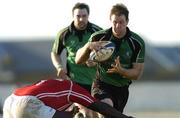 18 February 2006; Colm Rigney, Connacht, is tackled by Martyn Madden, Llanelli Scarlets. Celtic League 2005-2006, Connacht v Llanelli Scarlets, Sportsground, Galway. Picture credit: Damien Eagers / SPORTSFILE
