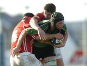 18 February 2006; David Gannon, Connacht, is tackled by Inokei Afeaki, right and John Davies, Llanelli Scarlets. Celtic League 2005-2006, Connacht v Llanelli Scarlets, Sportsground, Galway. Picture credit: Damien Eagers / SPORTSFILE