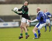 19 February 2006; Alan Cronin, Nemo Rangers, in action against Anthony Healey, St Gall's. AIB All-Ireland Club Football Championship, Semi-Final, St Gall's v Nemo Rangers, O'Moore Park, Portlaoise, Co. Laois. Picture credit: Brian Lawless / SPORTSFILE