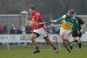 19 February 2006; Diarmuid O'Sullivan, Cork, in action against Brendan Murphy, Offaly. Allianz National Hurling League, Division 1A, Round 1, Offaly v Cork, St. Brendan's Park, Birr, Co. Offaly. Picture credit: Pat Murphy / SPORTSFILE