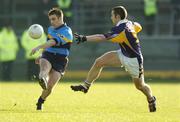 19 February 2006; Seamie Rabbitte, Salthill Knocknacarra, in action against Brian McGrath, Kilmacud Crokes. AIB All-Ireland Club Football Championship, Semi-Final, Salthill Knocknacarra v Kilmacud Crokes, Pearse Park, Longford. Picture credit: Damien Eagers / SPORTSFILE