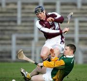 19 February 2006;  Galways Eugene Cloonan sees his shot saved at point blank by Antrim's Damien Quinn. Allianz National Hurling League, Antrim v Galway, Casement Park, Belfast, Co. Antrim. Picture credit: Oliver McVeigh / SPORTSFILE