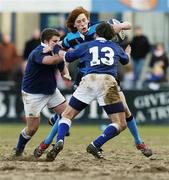 19 February 2006; Niall O'Donoghue, Castleknock, is tackled by Jack Buggy, 13, and Mark McKay, St Mary's. Leinster Schools Senior Cup, St Mary's v Castleknock, Donnybrook, Dublin. Picture credit: Ciara Lyster / SPORTSFILE
