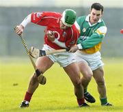 19 February 2006; Niall McCarthy, Cork, in action against David Franks, Offaly. Allianz National Hurling League, Division 1A, Round 1, Offaly v Cork, St. Brendan's Park, Birr, Co. Offaly. Picture credit: Pat Murphy / SPORTSFILE