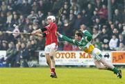 19 February 2006; Timmy McCarthy, Cork, in action against Gary Hanniffy, Offaly. Allianz National Hurling League, Division 1A, Round 1, Offaly v Cork, St. Brendan's Park, Birr, Co. Offaly. Picture credit: Pat Murphy / SPORTSFILE