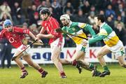 19 February 2006; Kieran Murphy, Cork, in action against Kevin Brady, and David Franks, right, Offaly. Allianz National Hurling League, Division 1A, Round 1, Offaly v Cork, St. Brendan's Park, Birr, Co. Offaly. Picture credit: Pat Murphy / SPORTSFILE