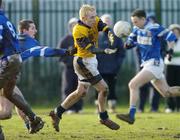 15 February 2006; Conor Mortimor, DCU, is tackled by Tommy Brosnan, Garda College. Datapac Sigerson Cup, Quarter-Final, Garda College v DCU, Garda College Sportsfield Complex, Templemore, Co. Tipperary. Picture credit: Matt Browne / SPORTSFILE