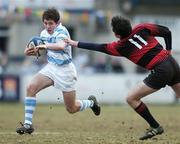 22 February 2006; Jan Simon Byrne, Blackrock College, evades the tackle of Matthew Ruddock, Kilkenny College, on his way to scoring his sides second try. Leinster Schools Senior Cup, 2nd Round, Blackrock College v Kilkenny College, Donnybrook, Dublin. Picture credit: Brendan Moran / SPORTSFILE