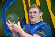 1 May 2014; Bank of Ireland Leinster Player of the Month for February / March is Tadhg Furlong. Tadhg was voted as the winner by Leinster supporters on Twitter from a shortlist selected by the Leinster team management which also included Darragh Fanning and Noel Reid. Voting for the April award, between Jamie Heaslip, Noel Reid and Cian Healy, is now open via @bankofireland twitter using #boirugby. Paddy Power who presented Tadhg with his award said, &quot;Our partnership with Bank Of Ireland @ Work quite simply makes our employees’ lives easier.  Their onsite presence and dedicated website helps make Paddy Power a great place to work!&quot;. Leinster Rugby HQ, UCD, Belfield, Dublin. Picture credit: Stephen McCarthy / SPORTSFILE
