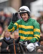 2 May 2014; Jockey Tony McCoy celebrates as he is led into the winners enclosure after winning the Racing Post Champion Hurdle aboard Jezki. Punchestown Racecourse, Punchestown, Co. Kildare. Picture credit: Barry Cregg / SPORTSFILE