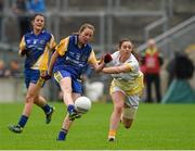 3 May 2014; Laura Fleming, Roscommon, in action against Rachael Fullerton, Antrim. TESCO Ladies National Football League Division 4 Final, Antrim v Roscommon, O'Connor Park, Tullamore, Co. Offaly. Picture credit: Ray McManus / SPORTSFILE