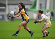 3 May 2014; Jenny Higgins, Roscommon, in action against Sinéad McLoughlin, Antrim. TESCO Ladies National Football League Division 4 Final, Antrim v Roscommon, O'Connor Park, Tullamore, Co. Offaly. Picture credit: Ray McManus / SPORTSFILE