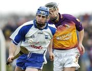 19 February 2006; Michael Walsh, Waterford, in action against Tomas Mahon, Wexford. Allianz National Hurling League, Division 1A, Round 1, Waterford v Wexford, Fraher Field, Dungarvan, Co. Waterford. Picture credit: Matt Browne / SPORTSFILE