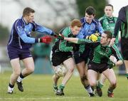 24 February 2006; Kevin Gunn, centre, and team-mate Conan O'Brien, right, Queens University, Belfast, in action against Mark Lynch, left, and Jonathan Bradley, University of Ulster, Jordanstown. Datapac Sigerson Cup, Semi-Final, Queens University, Belfast v University of Ulster, Jordanstown, DCU Grounds, Dublin. Picture credit: Brian Lawless / SPORTSFILE