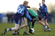 24 February 2006; Gerard O'Kane, Queens University, Belfast, in action against Colin Devlin, University of Ulster, Jordanstown. Datapac Sigerson Cup, Semi-Final, Queens University, Belfast v University of Ulster, Jordanstown, DCU Grounds, Dublin. Picture credit: Brian Lawless / SPORTSFILE