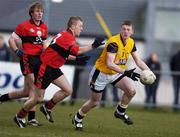 24 February 2006;Kevin Reilly, Dublin City University, in action against Conor Brosnan, University College Cork. Datapac Sigerson Cup, Semi-Final, Dublin City University v University College Cork, DCU Grounds, Dublin. Picture credit: Brian Lawless / SPORTSFILE