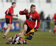24 February 2006; Tim Regan, University College Cork, in action against Ross McConnell, Dublin City University. Datapac Sigerson Cup, Semi-Final, Dublin City University v University College Cork, DCU Grounds, Dublin. Picture credit: Brian Lawless / SPORTSFILE