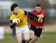 24 February 2006; Brendan Egan, Dublin City University, in action against Anthony Dunne, University College Cork. Datapac Sigerson Cup, Semi-Final, Dublin City University v University College Cork, DCU Grounds, Dublin. Picture credit: Brian Lawless / SPORTSFILE