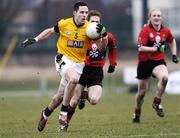 24 February 2006; Declan Lally, Dublin City University, in action against Michael Cussen, University College Cork. Datapac Sigerson Cup, Semi-Final, Dublin City University v University College Cork, DCU Grounds, Dublin. Picture credit: Brian Lawless / SPORTSFILE