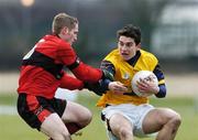 24 February 2006; Bernard Brogan, Dublin City University, in action against Michael Fitzgerald, University College Cork. Datapac Sigerson Cup, Semi-Final, Dublin City University v University College Cork, DCU Grounds, Dublin. Picture credit: Ray Lohan / SPORTSFILE