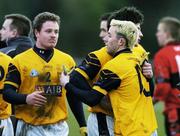 24 February 2006; DCU players Conor Mortimer, right, Brian O'Reilly, left, and Brendan Egan, celebrate at the final whistle. Datapac Sigerson Cup, Semi-Final, Dublin City University v University College Cork, DCU Grounds, Dublin. Picture credit: Ray Lohan / SPORTSFILE