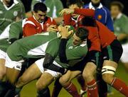 24 February 2006; Darren Cave, Ireland U21, is tackled by Andrew Bishop, Wales U21. Under 21 International 2005-2006, Ireland U21 v Wales U21, Dubarry Park, Athlone, Co. Westmeath. Picture credit: Matt Browne / SPORTSFILE