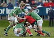 25 February 2006; Daniel Franks, Wales, is tackled by Thomas Anderson, left, David Pollock and Andrew O'Driscoll, right, Ireland. Under 19 International 2005-2006, Ireland U19 v Wales U19, Stradbrook Road, Dublin. Picture credit: Ray McManus / SPORTSFILE