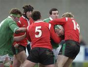 25 February 2006; Michael Barker, Ireland, is tackled by Lou Reed, 5, and Alec Jenkins, Wales. Under 19 International 2005-2006, Ireland U19 v Wales U19, Stradbrook Road, Dublin. Picture credit: Ray McManus / SPORTSFILE