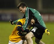 25 February 2006; Seanie Johnson, DCU, in action against Daniel McCartan, QUB. Datapac Sigerson Cup Final, Queens University, Belfast v Dublin City University, Parnell Park, Dublin. Picture credit: Damien Eagers / SPORTSFILE