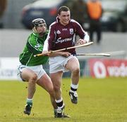 26 February 2006; Kevin Brady, Galway, in action against Mark O'Riordan, Limerick. Allianz National Hurling League, Division 1B, Round 2, Galway v Limerick, Pearse Stadium, Galway. Picture credit: Damien Eagers / SPORTSFILE