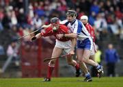 26 February 2006; Conor Cusack, Cork, in action against Tom Feeney, Waterford. Allianz National Hurling League, Division 1A, Round 2, Cork v Waterford, Pairc Ui Rinn, Cork. Picture credit: Pat Murphy / SPORTSFILE