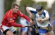 26 February 2006; Jack Kennedy, Waterford, in action against Diarmuid O'Sullivan, Cork. Allianz National Hurling League, Division 1A, Round 2, Cork v Waterford, Pairc Ui Rinn, Cork. Picture credit: Pat Murphy / SPORTSFILE