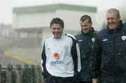28 February 2006; Robbie Keane, left, who was announced as the new Republic of Ireland captain,with Shay Given, vice captain, and Pat Costello, Director, Corporate Affairs, Football  Association of Ireland, during a snow shower after squad training. Lansdowne Road, Dublin. Picture credit: David Maher / SPORTSFILE