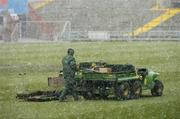 28 February 2006; A member of the Lansdowne Road ground staff at work on the pitch after squad training. Lansdowne Road, Dublin. Picture credit: David Maher / SPORTSFILE