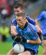 3 May 2014; Paul Mannion, Dublin, is tackled by Seán Mullooly, Roscommon. Cadbury GAA Football All-Ireland U21 Championship Final, Dublin v Roscommon, O'Connor Park, Tullamore, Co. Offaly. Picture credit: Ray McManus / SPORTSFILE