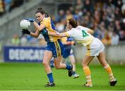 3 May 2014; Sinéad Kenny, Roscommon, in action against Jenny McKenna, Antrim. TESCO Ladies National Football League Division 4 Final, Antrim v Roscommon, O'Connor Park, Tullamore, Co. Offaly. Picture credit: Dáire Brennan / SPORTSFILE